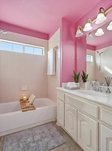 a room with a bed and a chair