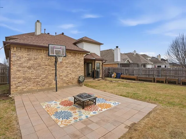 a bathroom with a sink vanity tub and a mirror