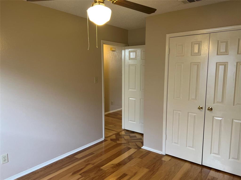 Undisclosed Address Plano, TX 75025 - Photo 12 of 15 a view of empty room with wooden floor