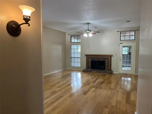 a view of a livingroom with a fireplace