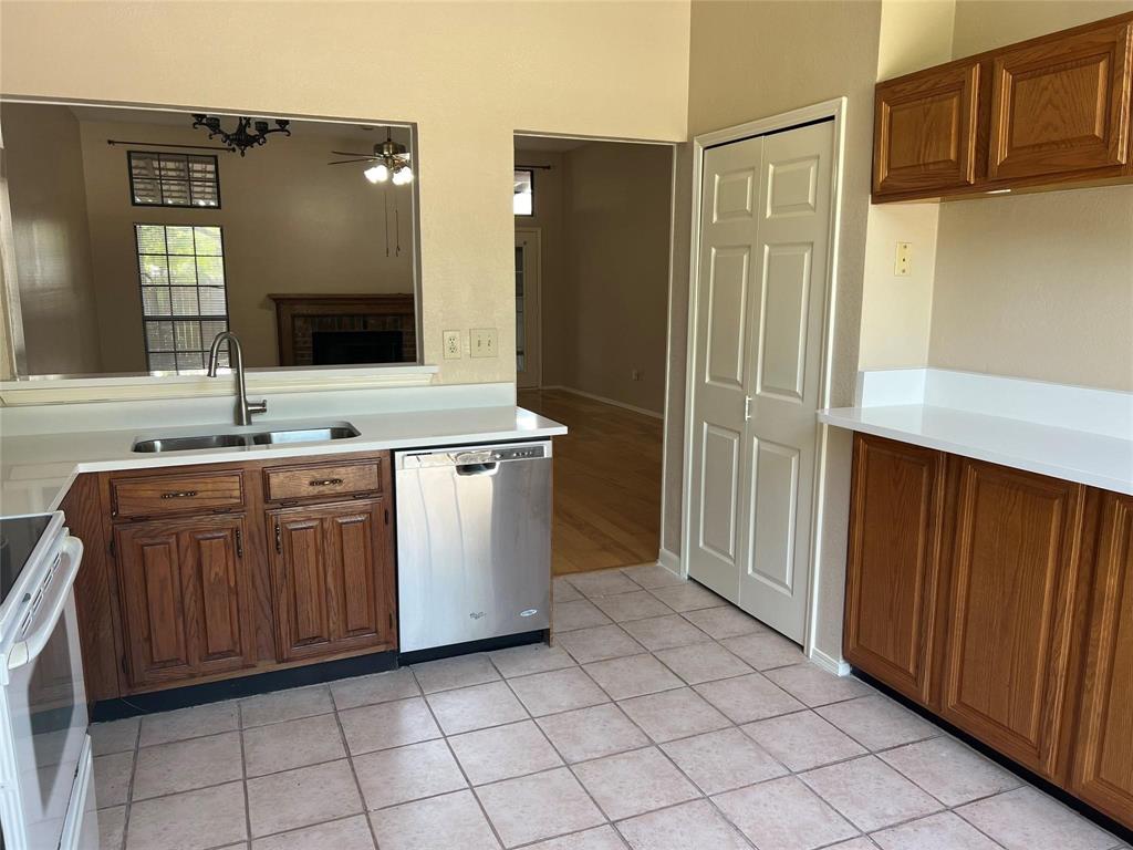 Undisclosed Address Plano, TX 75025 - Photo 5 of 15 a bathroom with a sink a vanity and a mirror