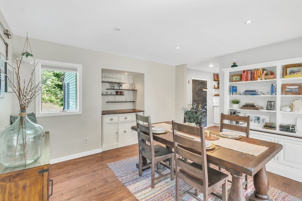 11 Pine Ridge Road Montgomery, MA 01085 - Photo 11 of 42 a dining room with a wooden table and chairs