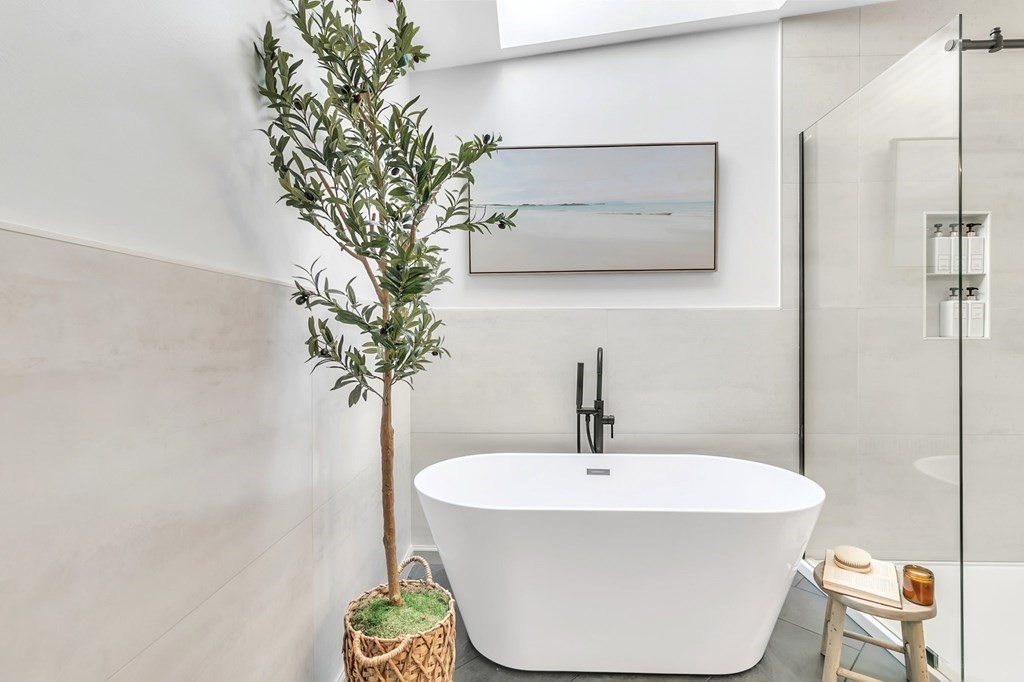 11 Pine Ridge Road Montgomery, MA 01085 - Photo 21 of 42 a white bath tub sitting in a bathroom