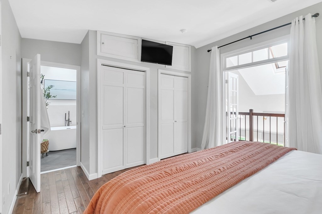 11 Pine Ridge Road Montgomery, MA 01085 - Photo 25 of 42 a bedroom with a bed and a large window