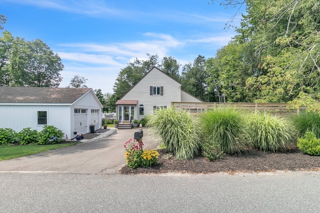 11 Pine Ridge Road Montgomery, MA 01085 - Photo 4 of 42 front view of a house with a garden