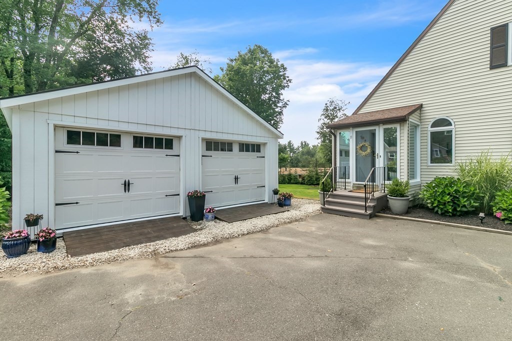11 Pine Ridge Road Montgomery, MA 01085 - Photo 5 of 42 a view of a house with backyard and a tree