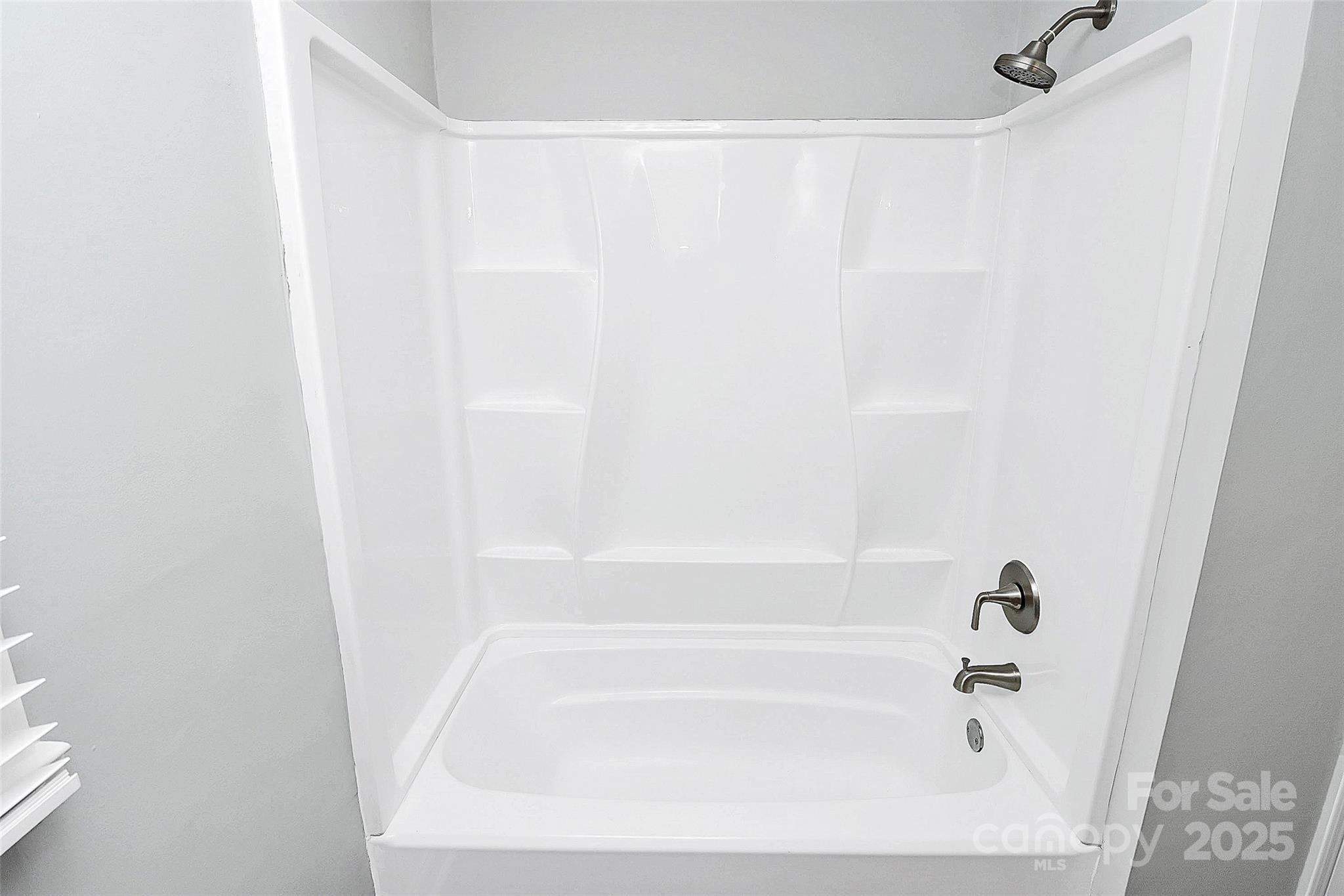 710 Plantation Road Lancaster, SC 29720 - Photo 15 of 29 a bathroom with a bathtub