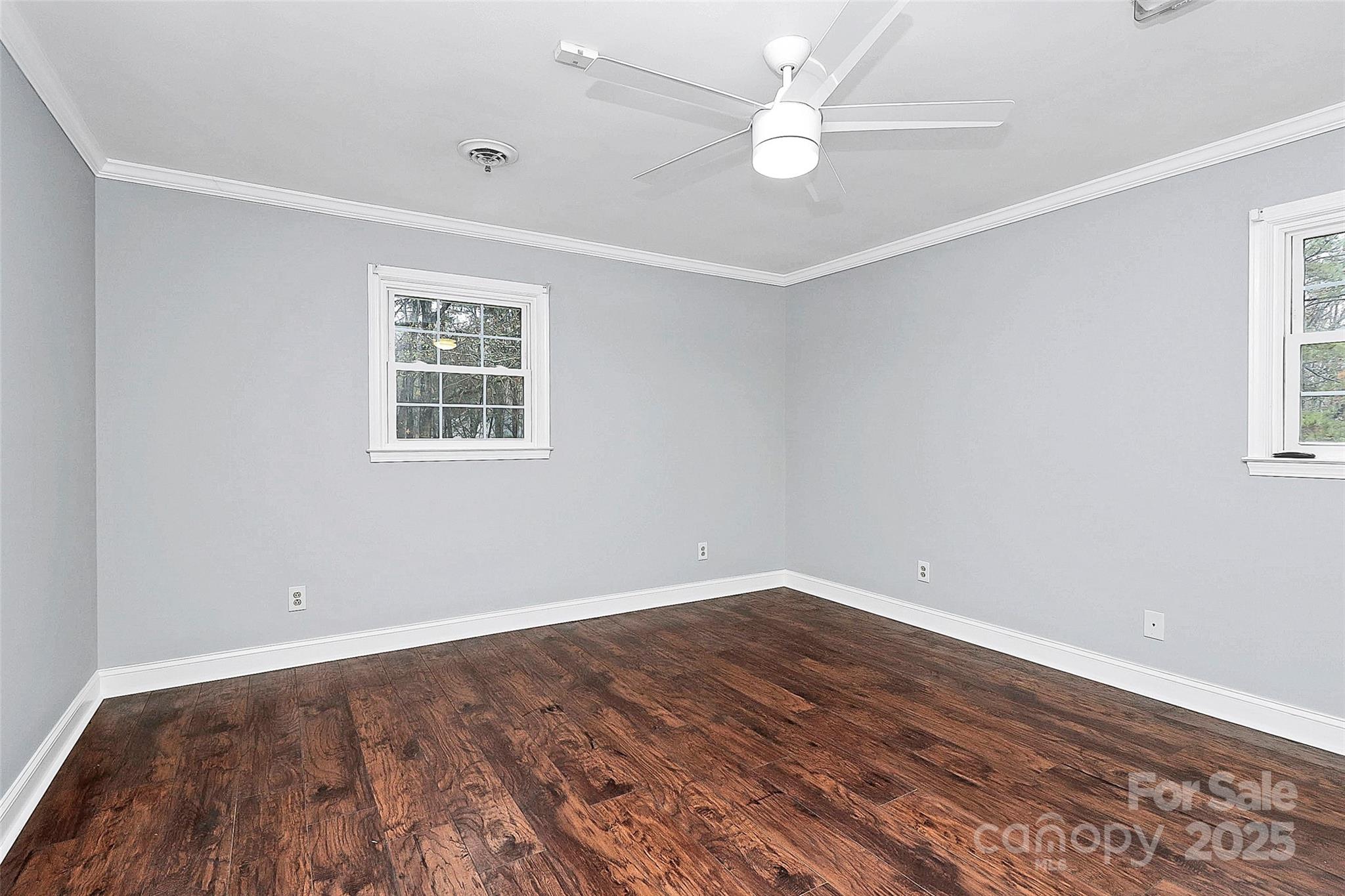 710 Plantation Road Lancaster, SC 29720 - Photo 16 of 29 wooden floor in an empty room with a window