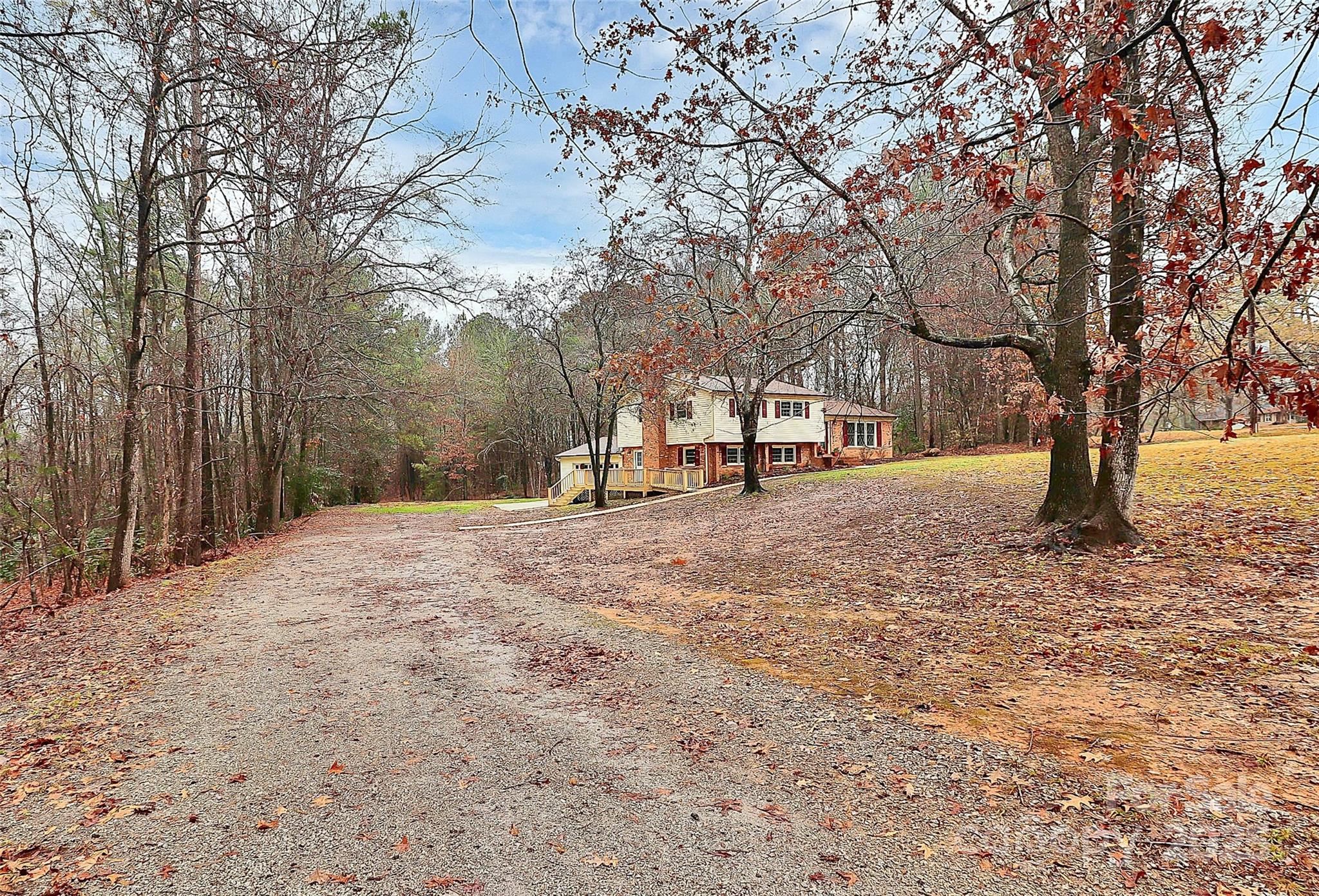 710 Plantation Road Lancaster, SC 29720 - Photo 2 of 29 a view of outdoor space with trees