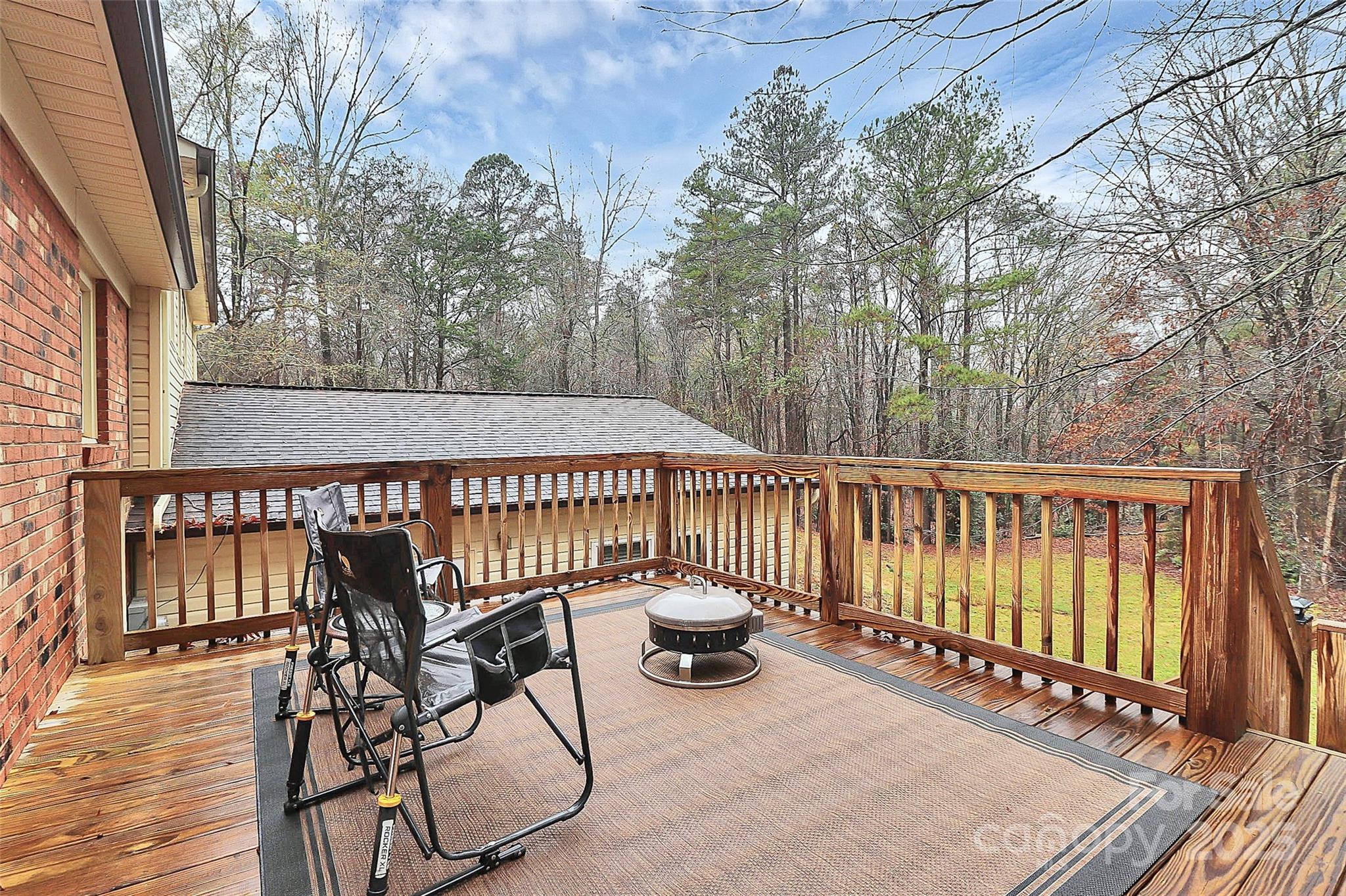 710 Plantation Road Lancaster, SC 29720 - Photo 3 of 29 a view of a chairs on the roof deck