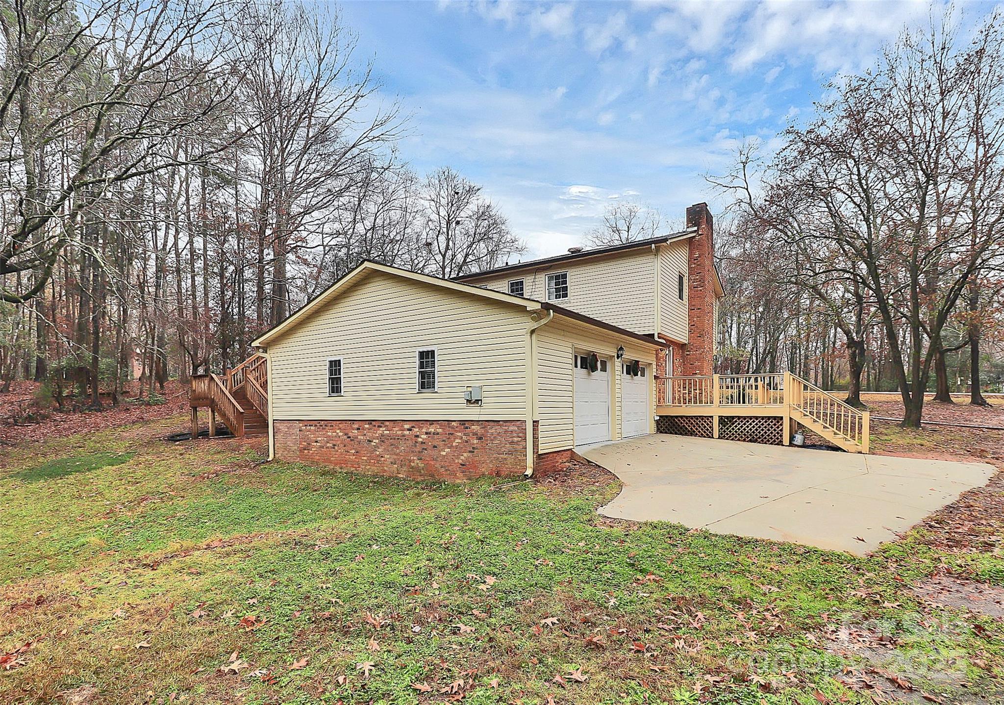 710 Plantation Road Lancaster, SC 29720 - Photo 5 of 29 a view of a house with a yard covered in snow