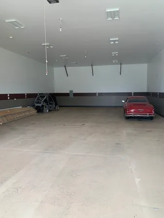 an empty room with a ceiling fan