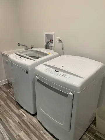 a utility room with dryer and washer