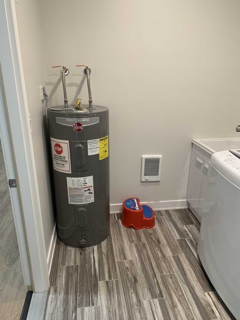 813 North Menge Road Marengo, IL 60152 - Photo 32 of 34 a bedroom with a bed and wooden floor