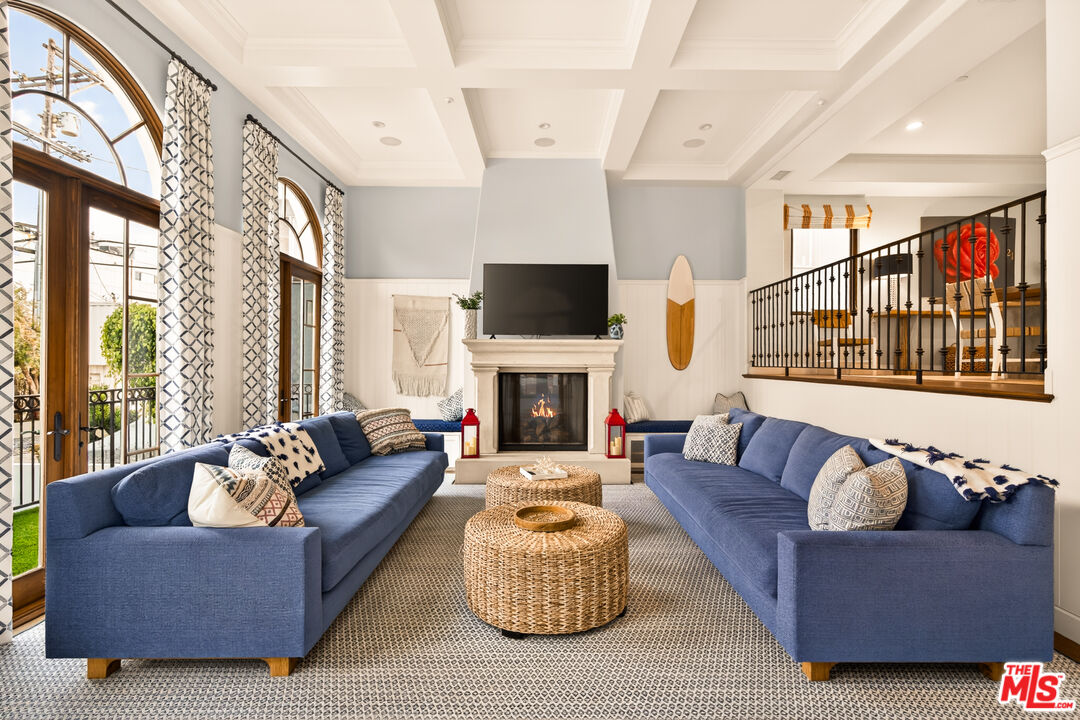 17 Privateer Street Marina del Rey, CA 90292 - Photo 13 of 47 a living room with fireplace furniture and a large window