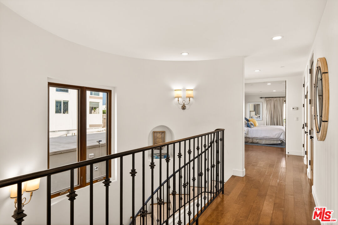 17 Privateer Street Marina del Rey, CA 90292 - Photo 27 of 47 a view of a hallway with a livingroom and wooden floor a bedroom