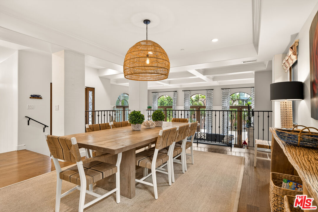 17 Privateer Street Marina del Rey, CA 90292 - Photo 3 of 47 a view of a dining room and hall with wooden floor