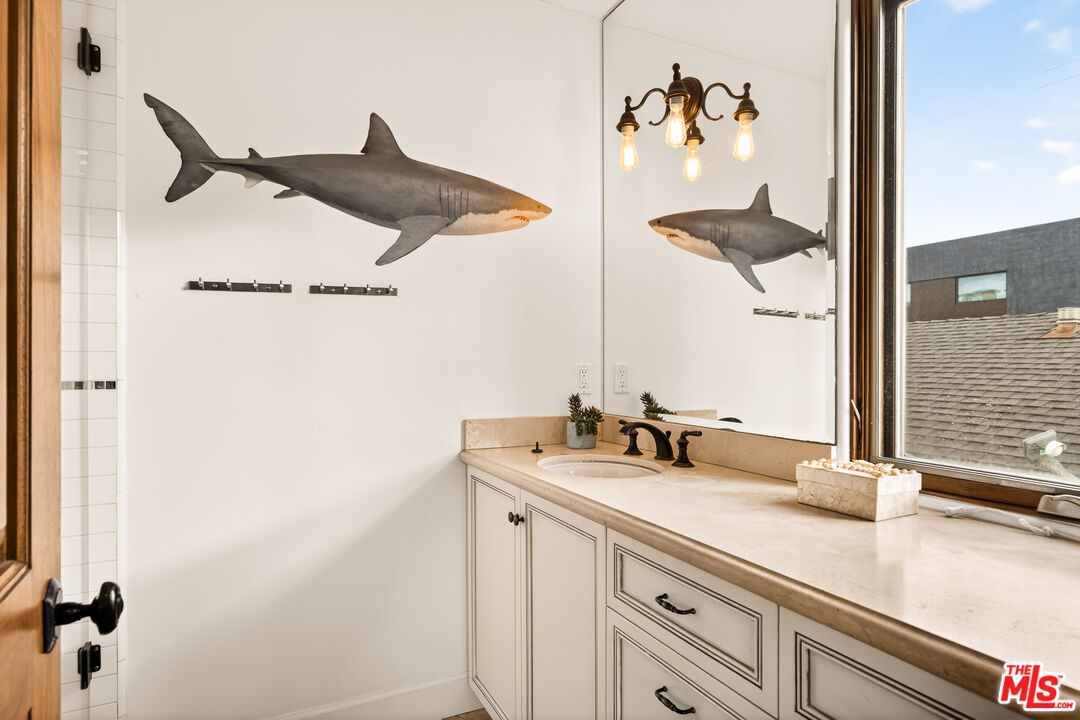 17 Privateer Street Marina del Rey, CA 90292 - Photo 34 of 47 a bathroom with a sink and a mirror