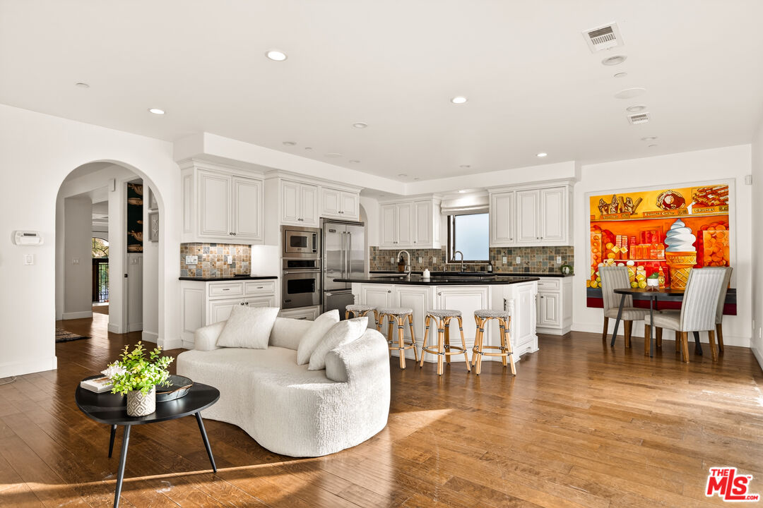17 Privateer Street Marina del Rey, CA 90292 - Photo 6 of 47 a living room with stainless steel appliances kitchen island granite countertop furniture and a large window