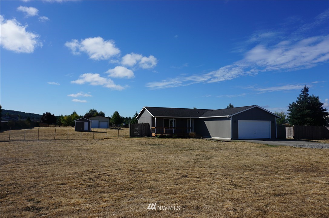 17849 Danby Drive Southwest Rochester, WA 98579 - Photo 1 of 23 a view of a house with a yard