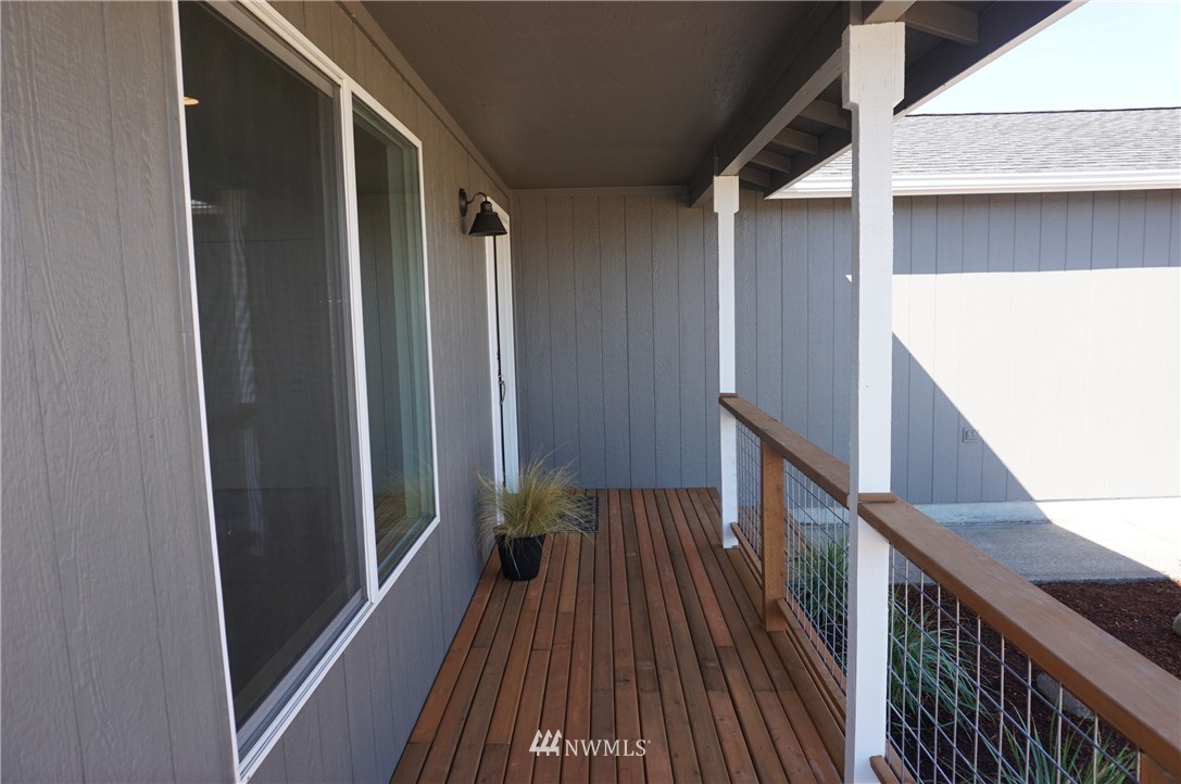 17849 Danby Drive Southwest Rochester, WA 98579 - Photo 3 of 23 a view of balcony with wooden floor