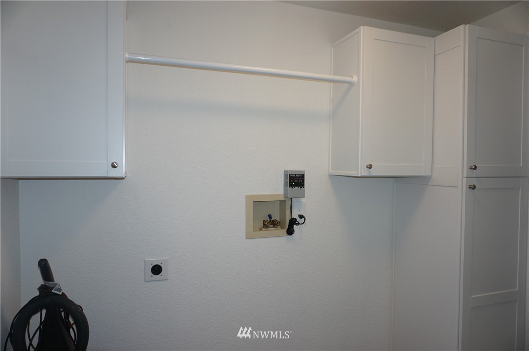 17849 Danby Drive Southwest Rochester, WA 98579 - Photo 23 of 23 a view of storage and utility room with racks on the wall