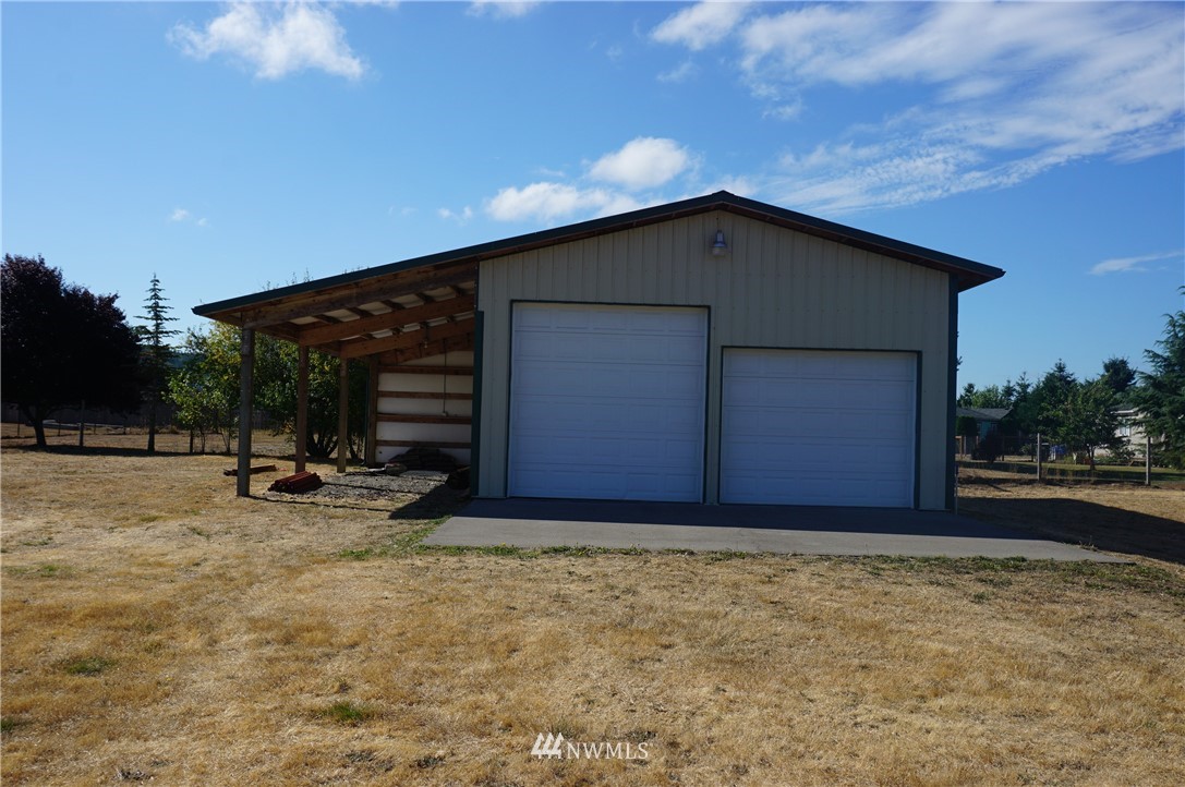 17849 Danby Drive Southwest Rochester, WA 98579 - Photo 7 of 23 a view of garage and yard