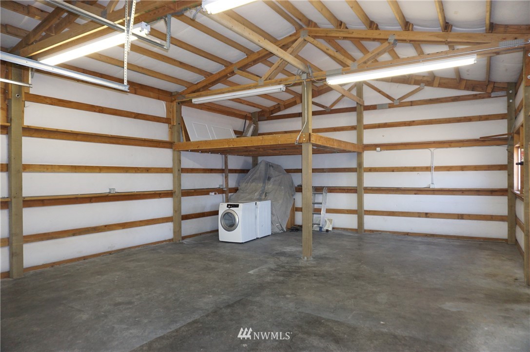 17849 Danby Drive Southwest Rochester, WA 98579 - Photo 9 of 23 a view of a room with racks on the wall