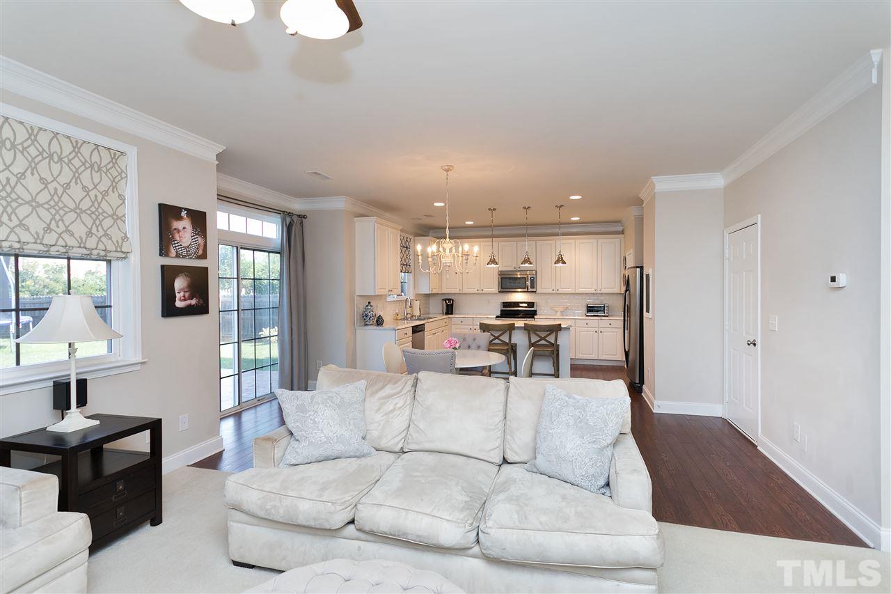 167 Solheim Lane Raleigh, NC 27603 - Photo 7 of 25 a living room with furniture and kitchen view