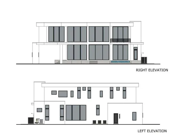 a black and white photo of a living room