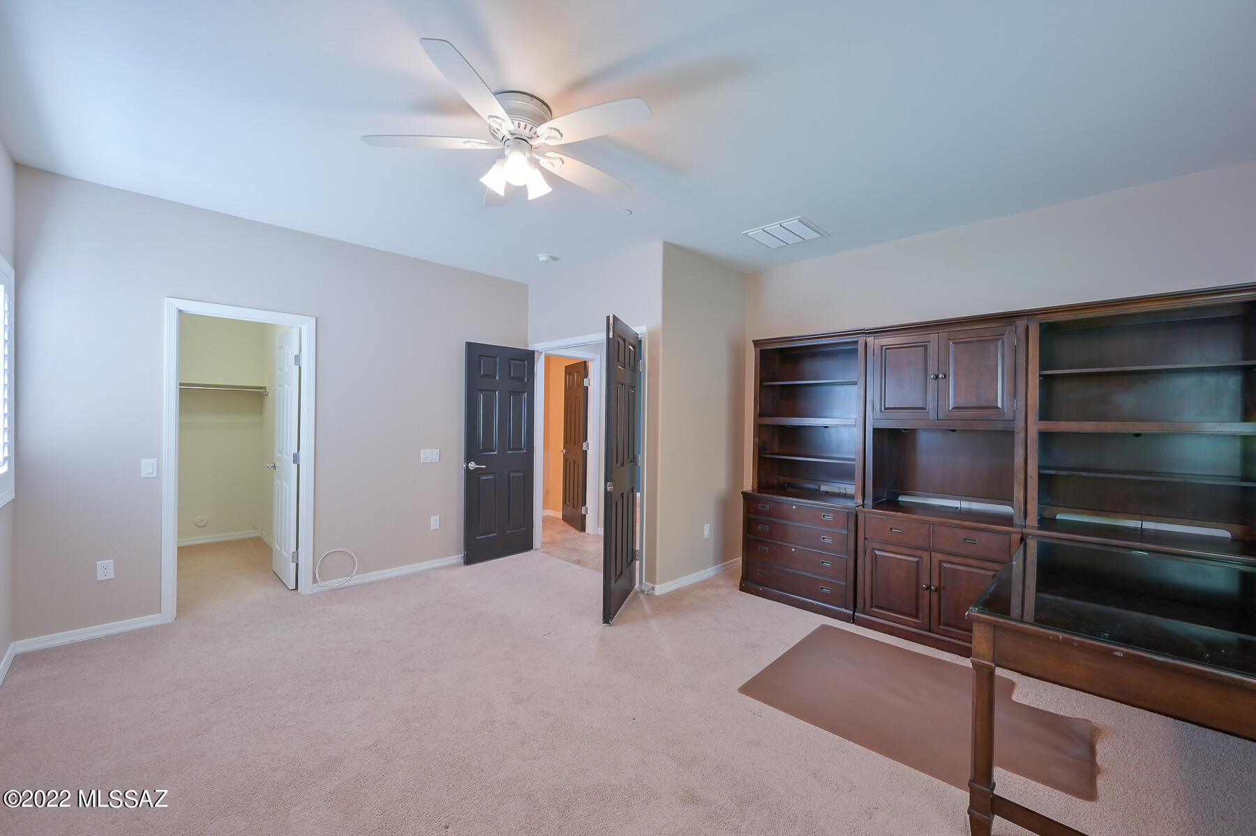 10804 East Salsabila Road Tucson, AZ 85747 - Photo 5 of 50 a view of an empty room with a closet