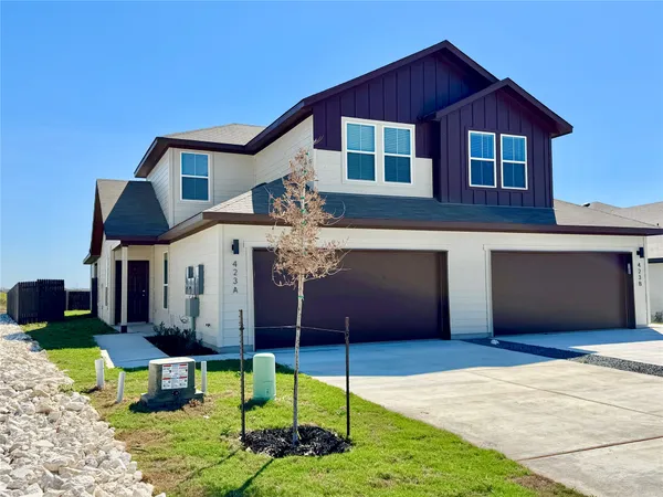 a front view of house with yard