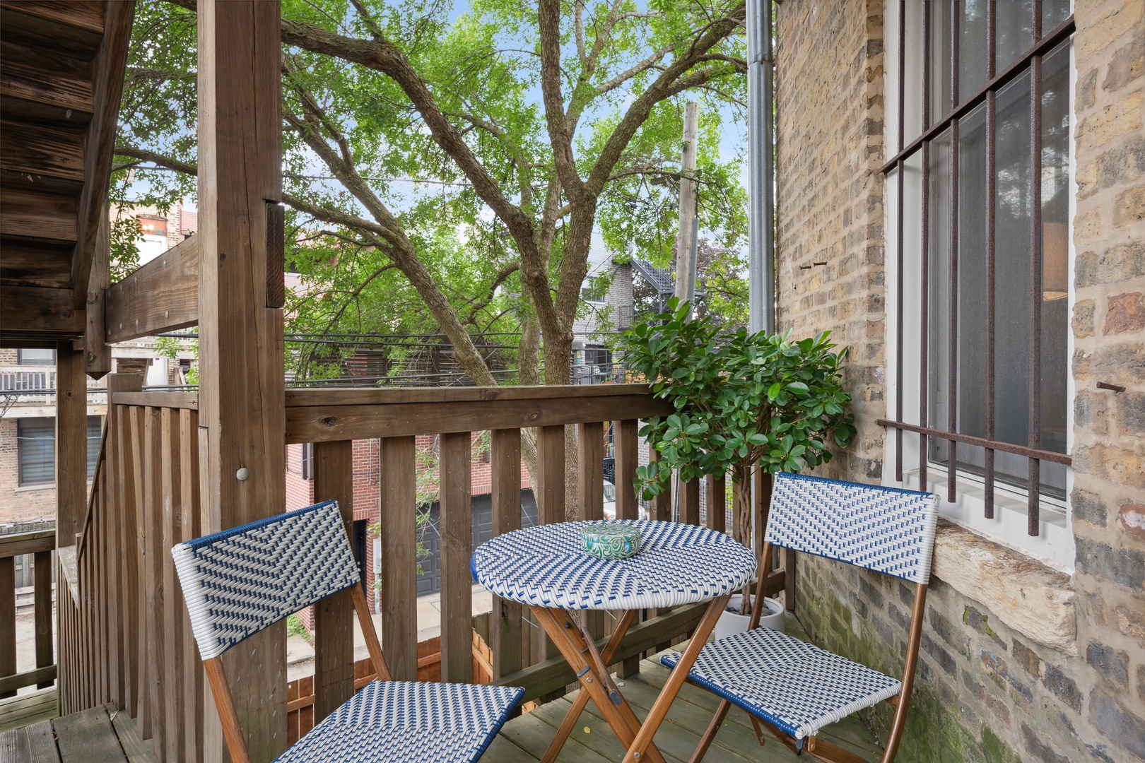 1667 North Bissell Street, Unit 2 Chicago, IL 60614 - Photo 14 of 14 a view of a two chairs in the balcony