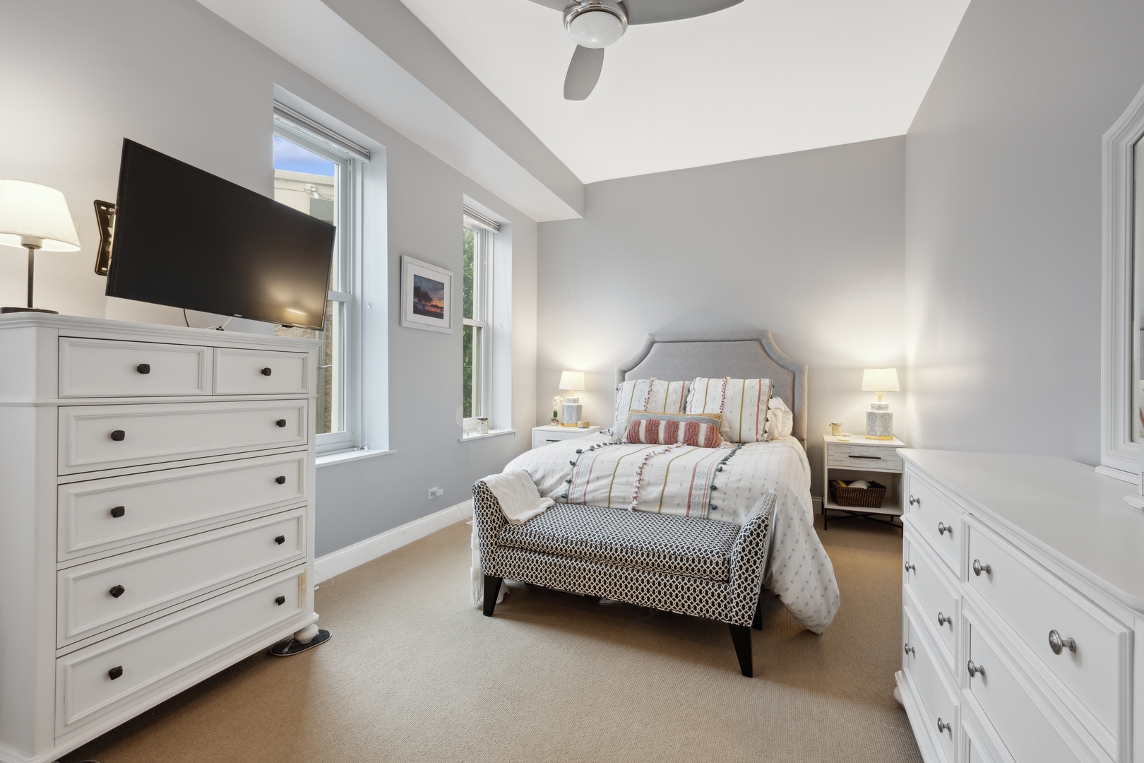 1667 North Bissell Street, Unit 2 Chicago, IL 60614 - Photo 8 of 14 a bedroom with a bed and flat screen tv