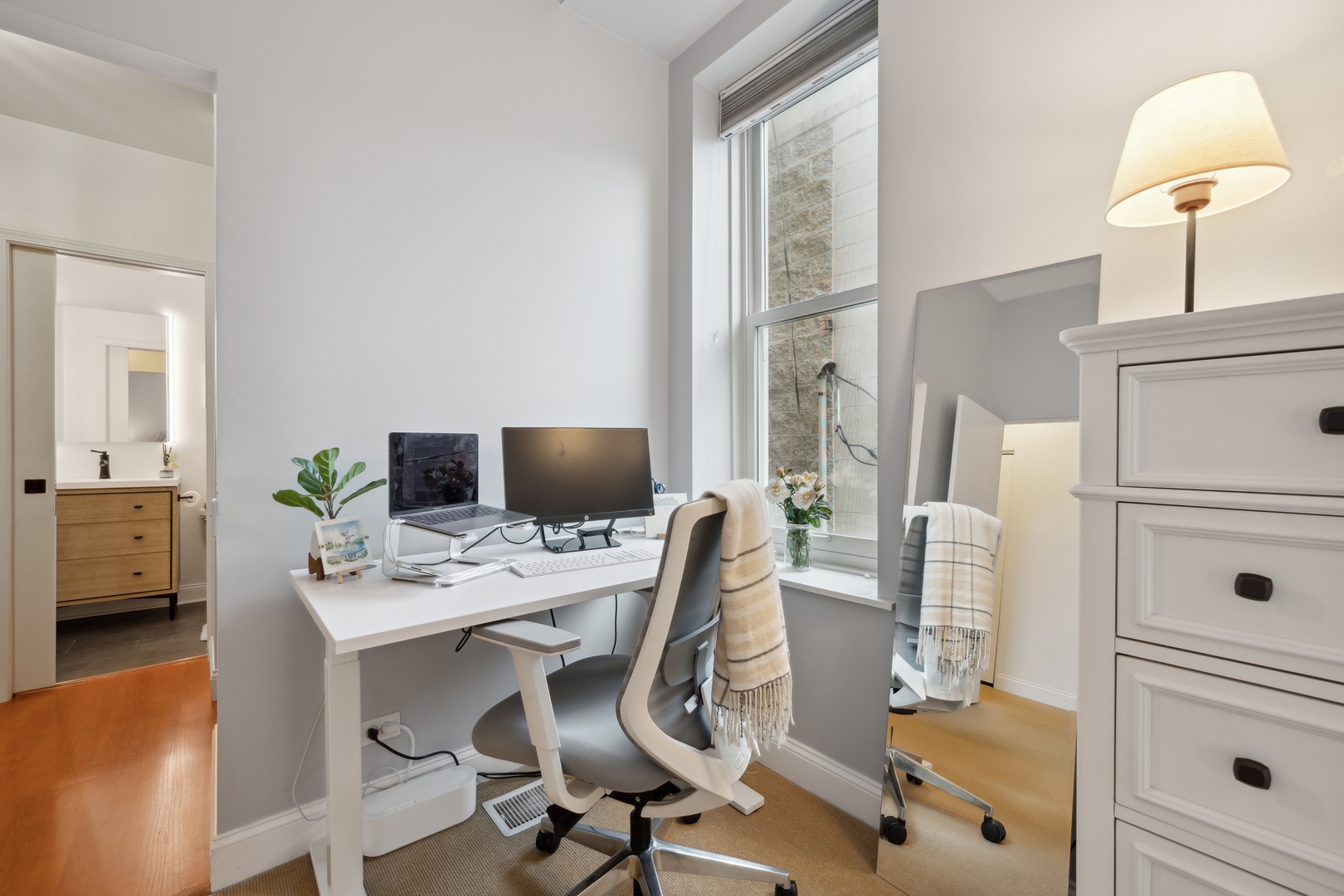 1667 North Bissell Street, Unit 2 Chicago, IL 60614 - Photo 9 of 14 a view of a workspace with furniture and a window