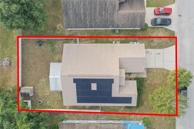 a front view of house with yard garage and green space
