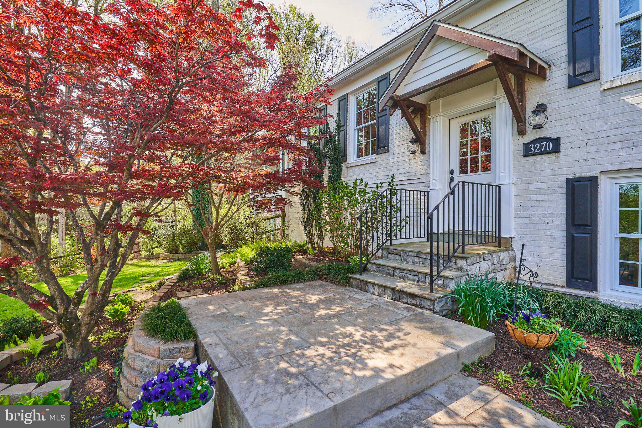 3270 Fox Mill Road Oakton, VA 22124 - Photo 3 of 66 Charming entrance with vibrant landscaping.