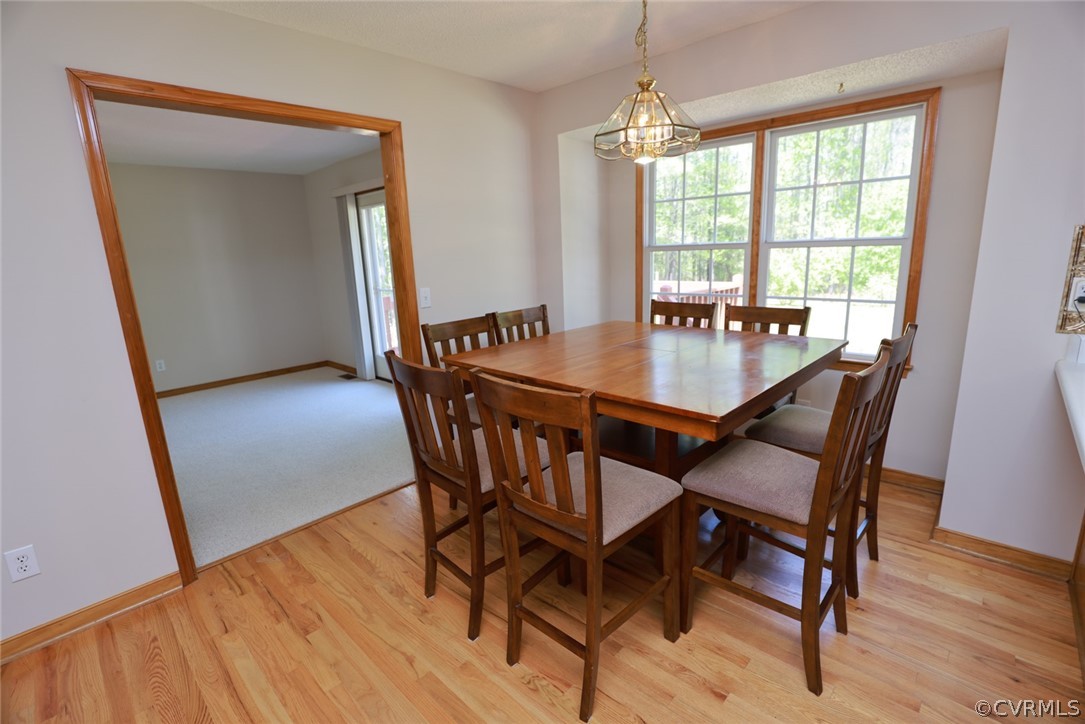 7100 Hair Road Disputanta, VA 23842 - Photo 11 of 40 a dining room with furniture and window