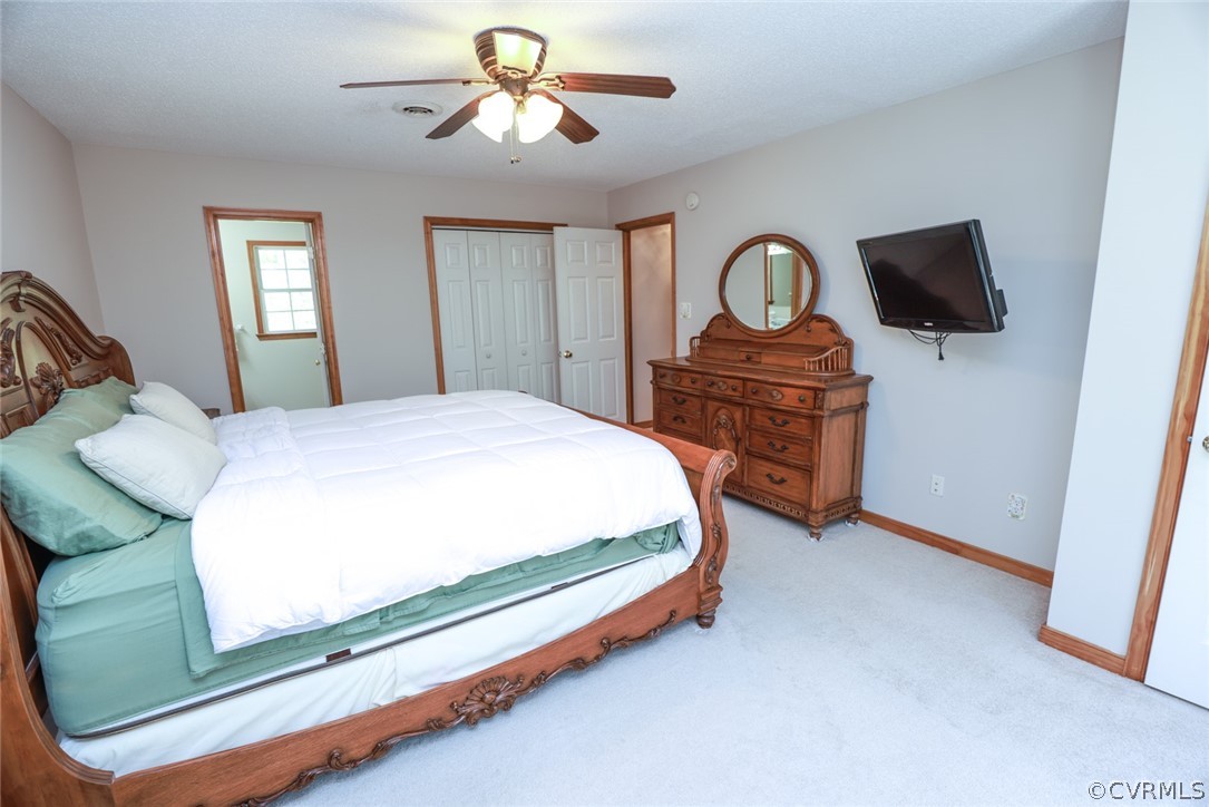 7100 Hair Road Disputanta, VA 23842 - Photo 17 of 40 a bedroom with a bed window and dresser