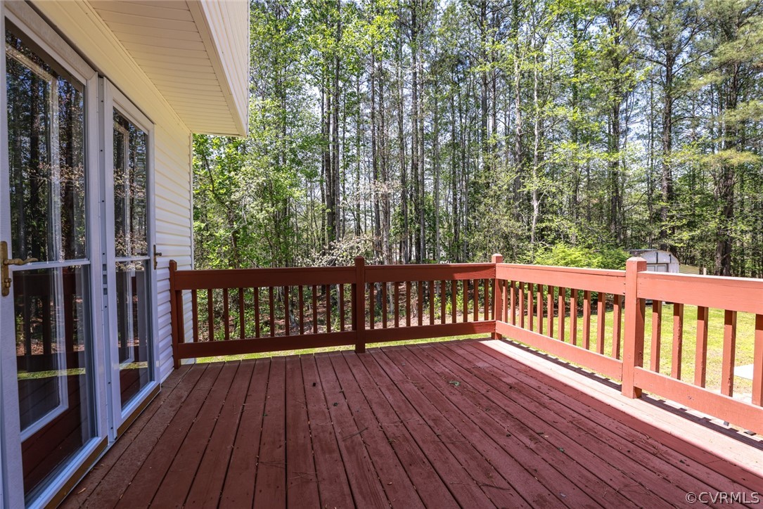 7100 Hair Road Disputanta, VA 23842 - Photo 33 of 40 a view of balcony with wooden floor