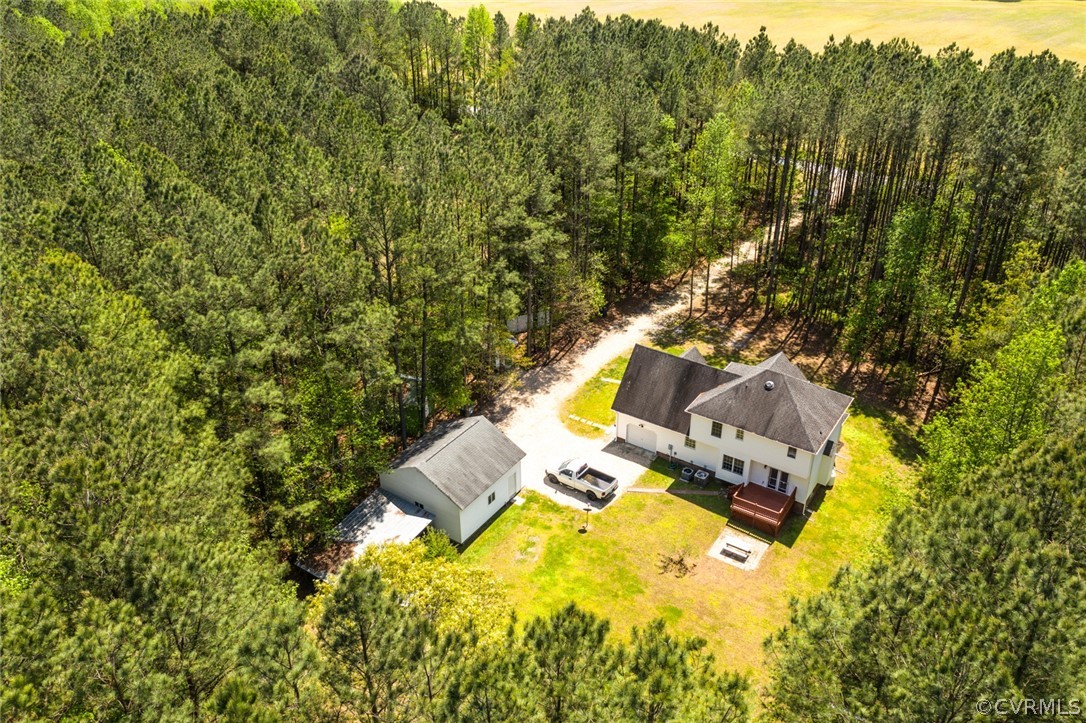 7100 Hair Road Disputanta, VA 23842 - Photo 35 of 40 a view of a house with a yard and trees