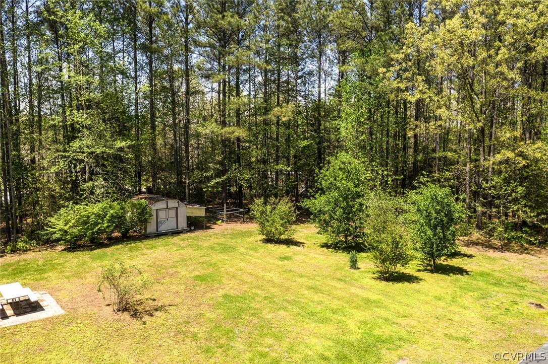 7100 Hair Road Disputanta, VA 23842 - Photo 4 of 40 a view of swimming pool with an outdoor space and seating area