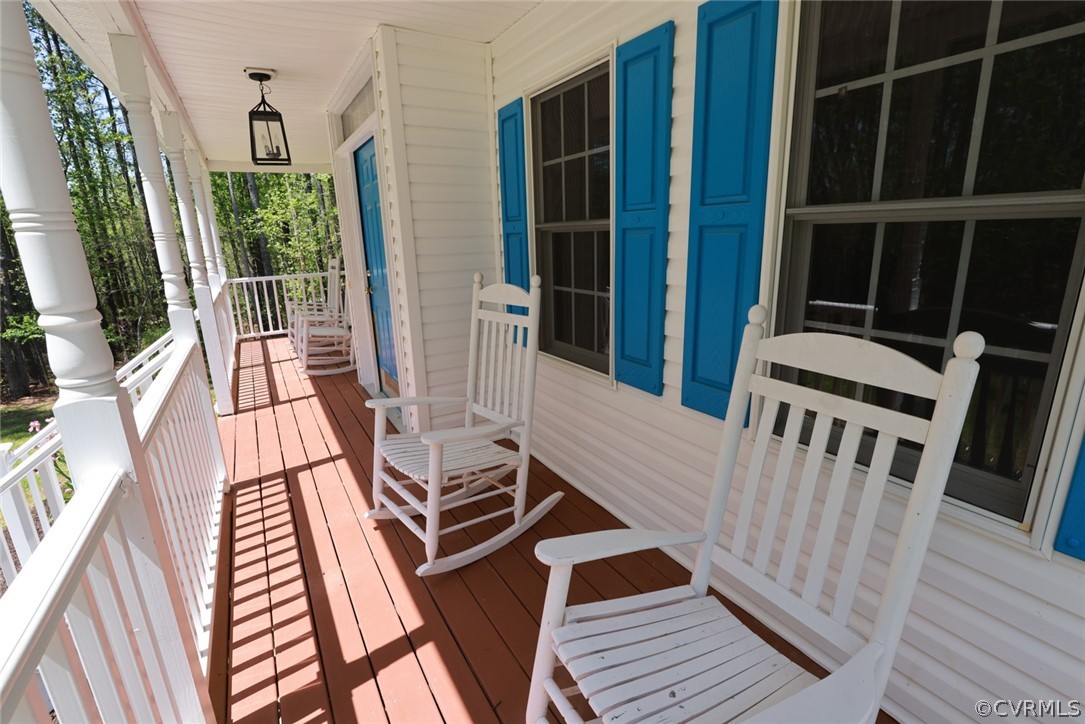 7100 Hair Road Disputanta, VA 23842 - Photo 5 of 40 a balcony view with a hardwood floor