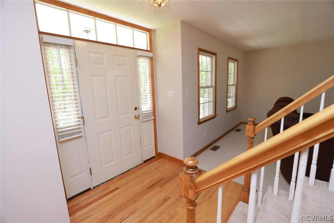 7100 Hair Road Disputanta, VA 23842 - Photo 6 of 40 a view of an entryway with wooden floor