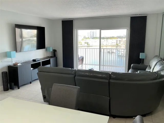 a living room with furniture and window