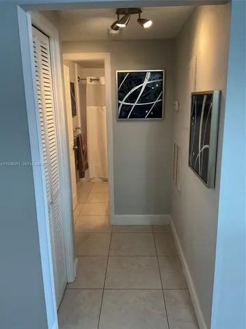 a view of hallway with stairs