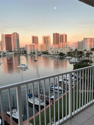 a view of a city with a lake