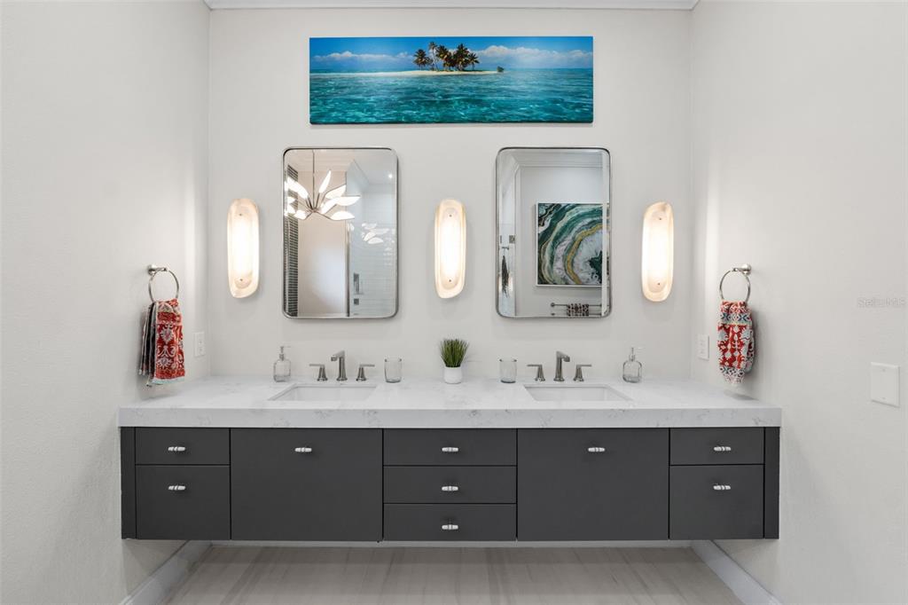 13137 Lake Butler Boulevard Windermere, FL 34786 - Photo 17 of 98 a bathroom with a double vanity sink and a mirror