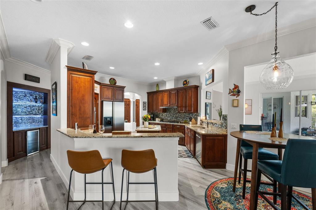 13137 Lake Butler Boulevard Windermere, FL 34786 - Photo 35 of 98 a kitchen with lots of counter space furniture and appliances