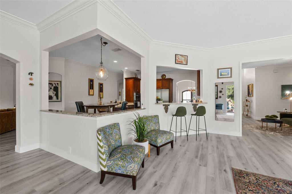 13137 Lake Butler Boulevard Windermere, FL 34786 - Photo 43 of 98 a living room with furniture and a wooden floor